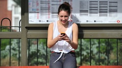 woman using iphone
